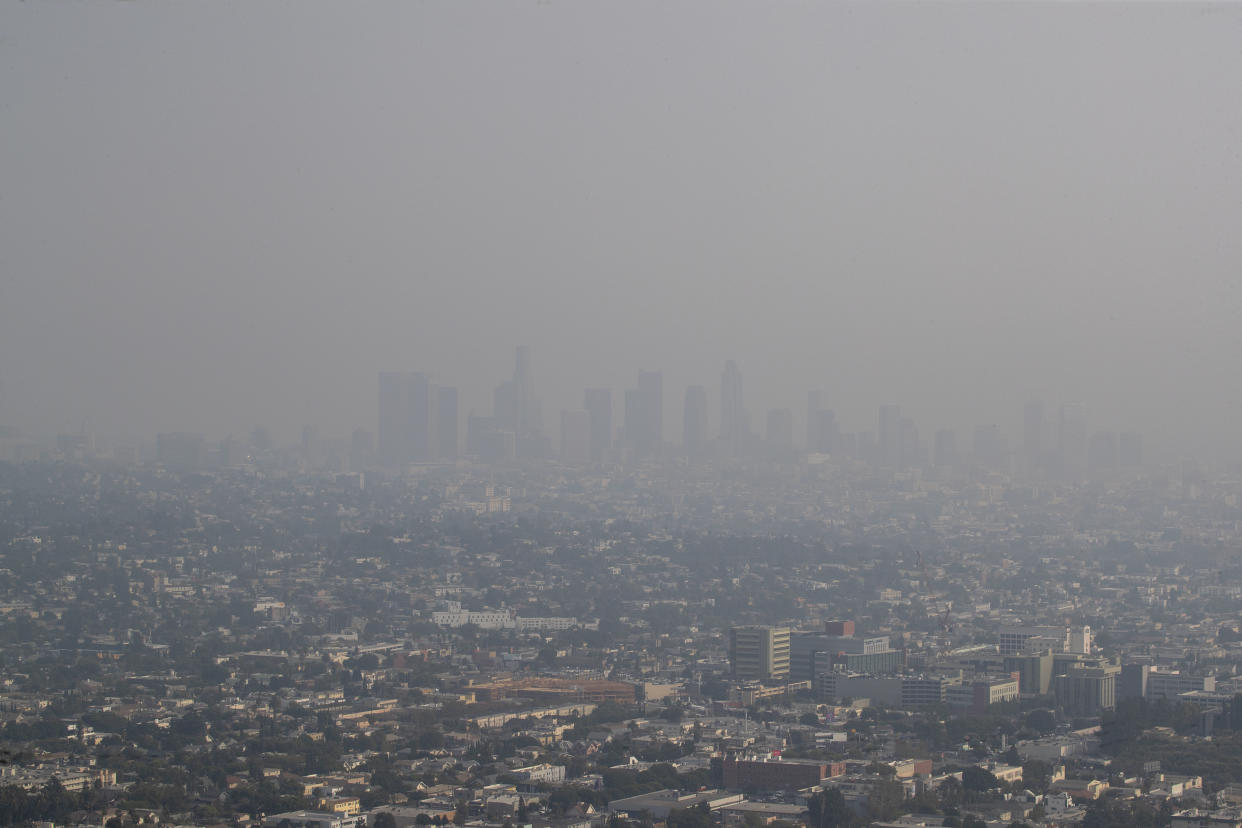 The view of downtown Los Angeles skyline is obscured by smoke, ash and smog as seen from the Griffith Observatory Monday, Sept. 14, 2020. / Credit: Allen J. Schaben / Los Angeles Times via Getty Images