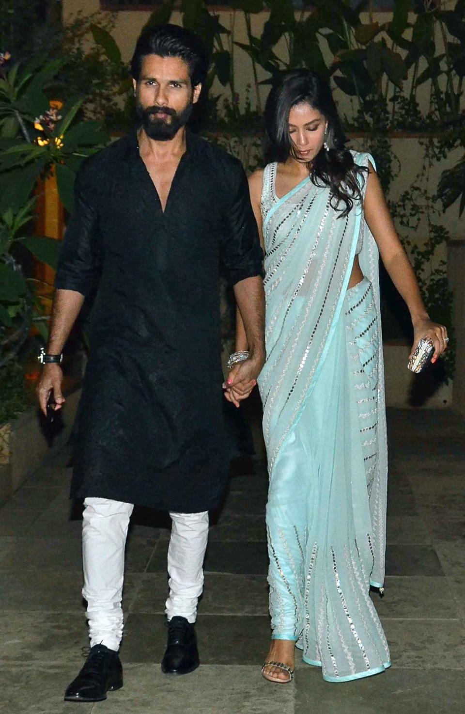 Shahid and Mira Kapoor look an adorable couple indeed. And yes, Mira’s sari is blue.