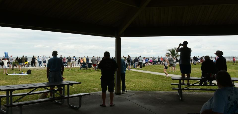 Spectators at Kennedy Point Park in Titusville waiting for the launch that was scrubbed for Thursday. The historic final launch of the ULA Delta IV Heavy from Launch Complex 37 at Cape Canaveral Space Force Station was scrubbed for March 28, but will now attempt liftoff on Friday.