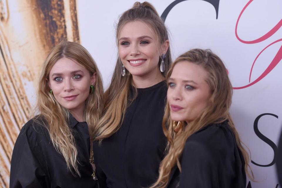 Family Affair: Elizabeth with sisters Ashley and Mary-Kate (Jamie McCarthy/Getty Images)