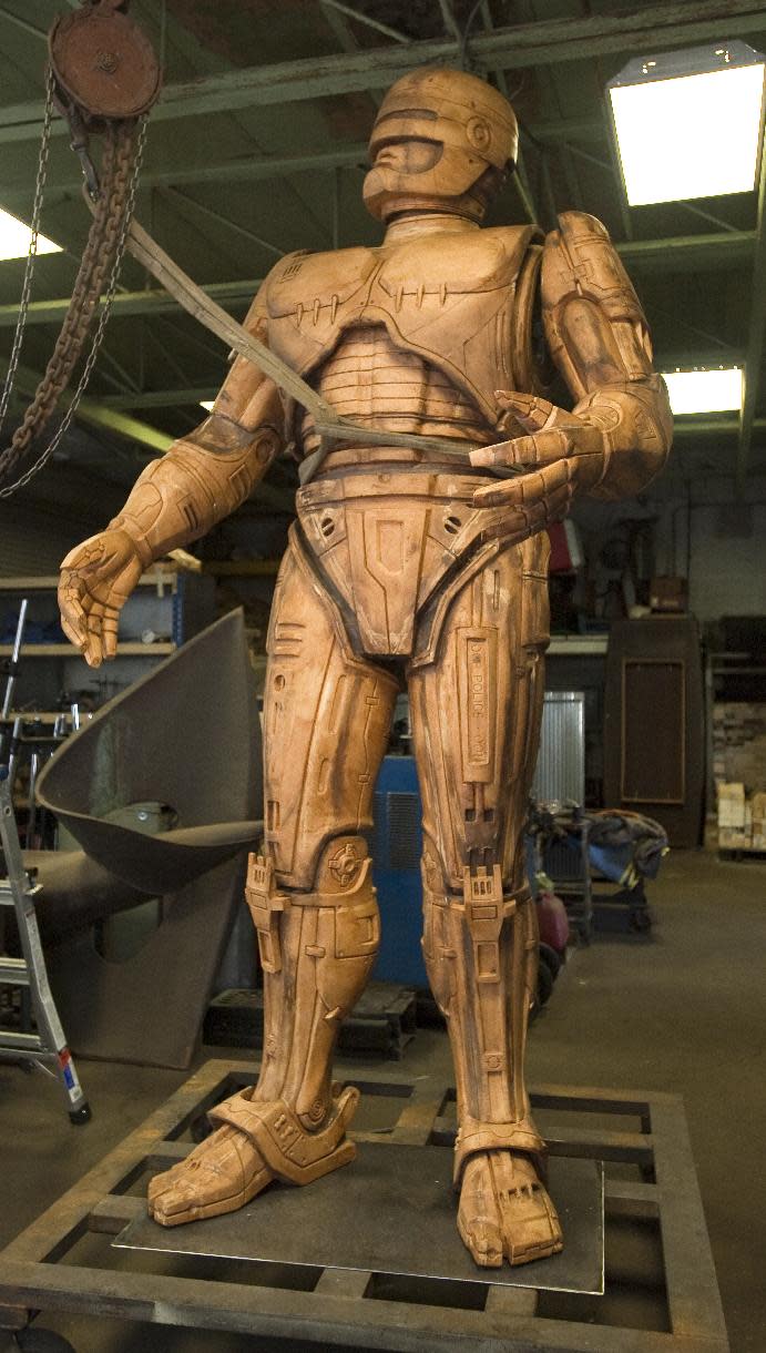 A foam model of the the fictional crime-fighting cyborg RoboCop statue stands inside Venus Bronze Works in Detroit, on Tuesday, Sept. 24, 2013. Venus Bronze Works in Detroit is getting ready to cast pieces of the statue. After this model is turned into a mold, the finished statue is set to be unveiled in summer of 2014. The 1980s science fiction movie was set in a futuristic and crime-ridden Detroit. (AP Photo/The Detroit News, David Guralnick )