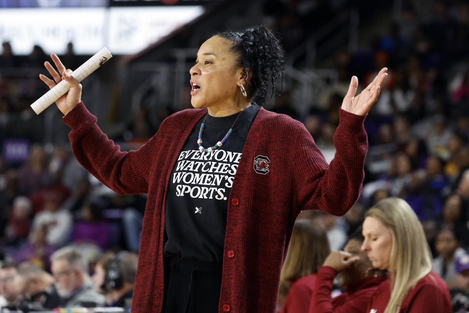 South Carolina head coach Dawn Staley coaches from the sideline against East Carolina during the second half of an NCAA college basketball game, Saturday, Dec. 30, 2023, in Greenville, N.C. (AP Photo/Karl B. DeBlaker)