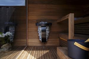 Harvia Spirit electric heater installed in a sauna