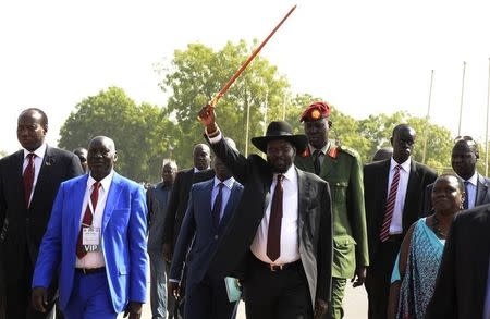 South Sudan's President Salva Kiir (C) acknowledges his supporters as he arrives to address a rally at John Garang's Mausoleum in the capital Juba March 18, 2015, on the peace talks process with South Sudan's rebel leader Riek Machar. REUTERS/Jok Solomun