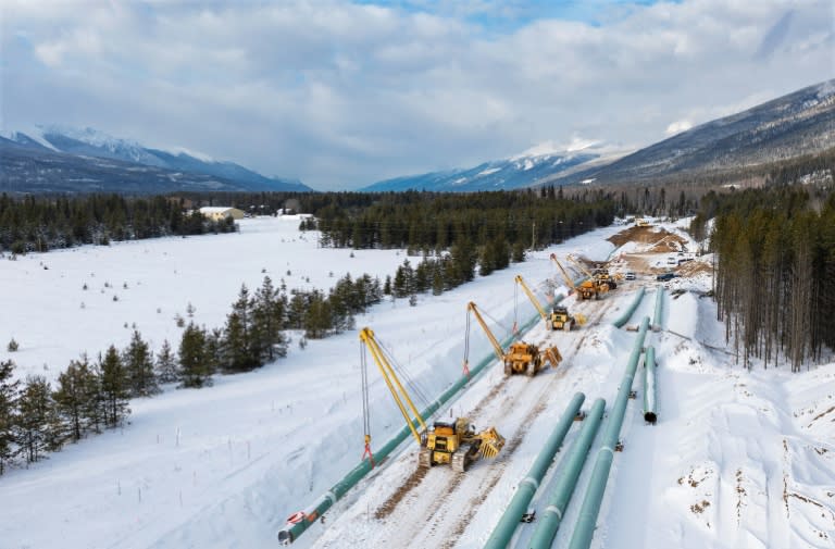 This December 9, 2021, image courtesy of Trans Mountain Corporation shows winter pipeline construction work in Valemount, British Columbia, Canada. The first major new pipeline to be built in Canada in decades is set to open on May 1 (Handout)