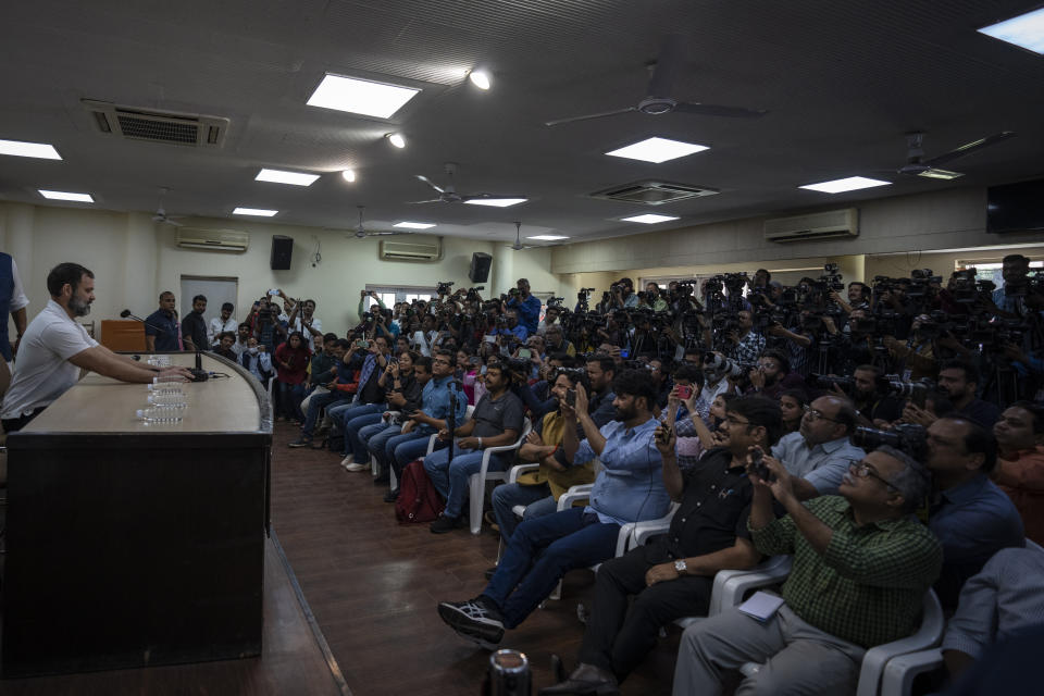 Indian opposition leader Rahul Gandhi addresses a press conference after he was expelled from parliament Friday, a day after a court convicted him of defamation and sentenced him to two years in prison for mocking the surname Modi in an election speech, in New Delhi, India, Saturday, March 25, 2023. The conviction and expulsion were widely condemned by opponents of Modi, who say democracy and free speech are under assault by a ruling government seeking to crush any dissent. (AP Photo/Altaf Qadri)