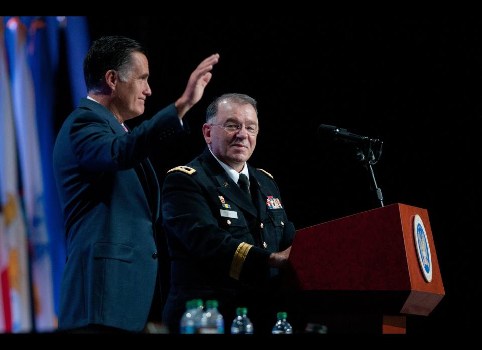 RENO, NV - SEPTEMBER 11:  Republican presidential candidate, former Massachusetts Gov. Mitt Romney waves after addressing the crowd with Maj. Gen. Francis D. Vavala (R) at the 134th National Guard Association Convention at the Reno-Sparks Convention Center, September 11, 2012 in Reno, Nevada. Romney was criticized for failing to mention the war in Afghanistan, and troops serving abroad in his keynote address at the Republican National Convention in Tampa, Florida. (Photo by David Calvert/Getty Images)