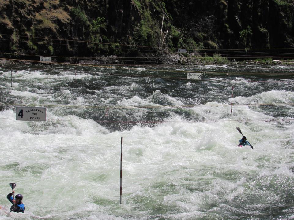 Two solo kayakers make their way through the class four section of Carter Falls on Saturday, May 20, 2023.