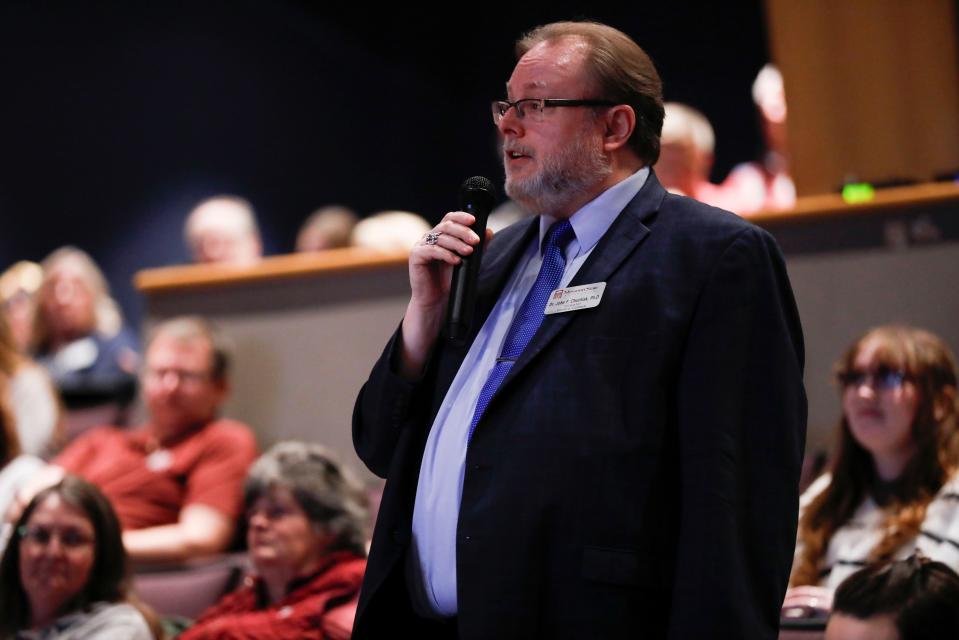 Missouri State University Honors College Director John Chuchiak asks a question to a finalist for the university president job, Richard "Biff" Williams, in the Plaster Student Union auditorium on Thursday, Feb. 15, 2024.