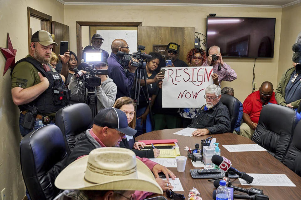 Residents call for the resignation of several McCurtain County officials at a county commissioners meeting April 17, 2023, in Idabel, Okla.  (Christopher Bryan / Southwest Ledger via AP)