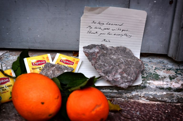 Stones, tea bags and oranges placed outside the summer house of late Canadian singer-songwritter and poet Leonard Cohen, on the Greek island of Hydra, on November 11, 2016