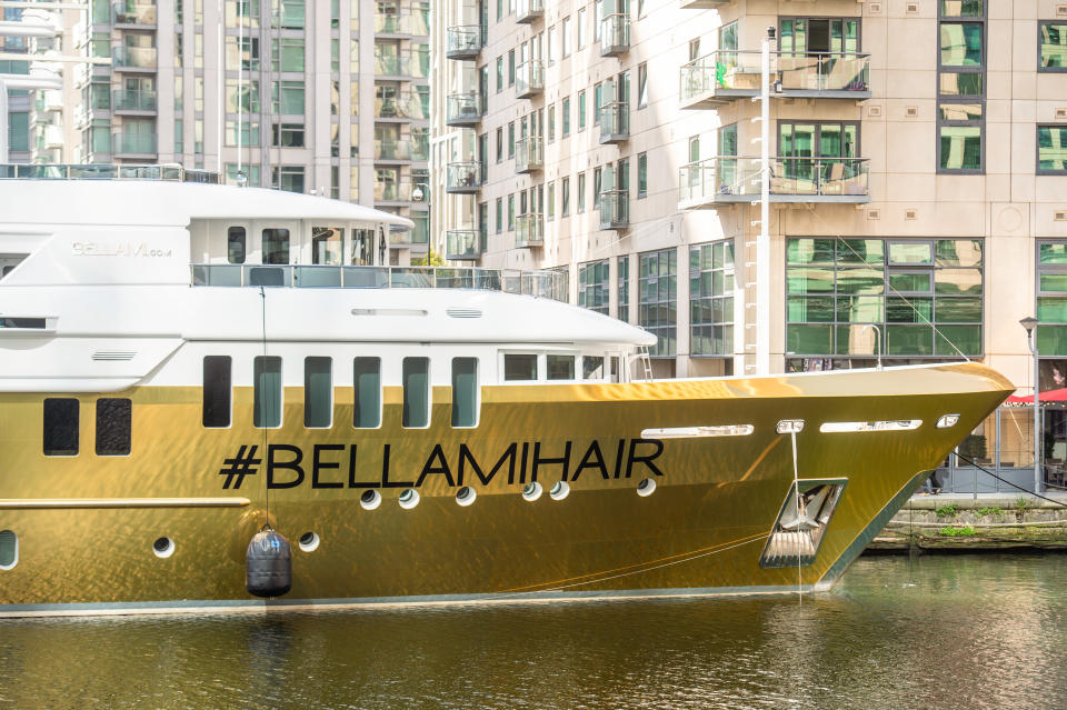 Wowza! The shining vessel named Bellami is covered in yards of gold vinyl wrap and is currently being patched up.  (SWNS)