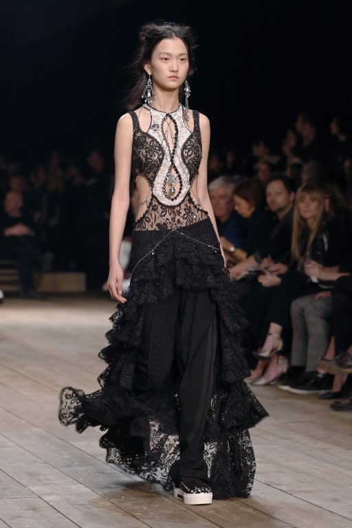 A model presents a creation for Alexander McQueen during the 2016 Spring/Summer ready-to-wear collection fashion show, on October 4, 2015 in Paris