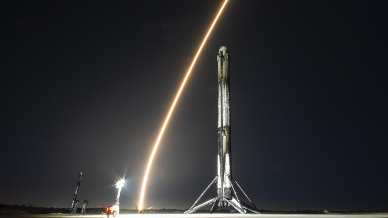  A rocket launching in the blackness. 