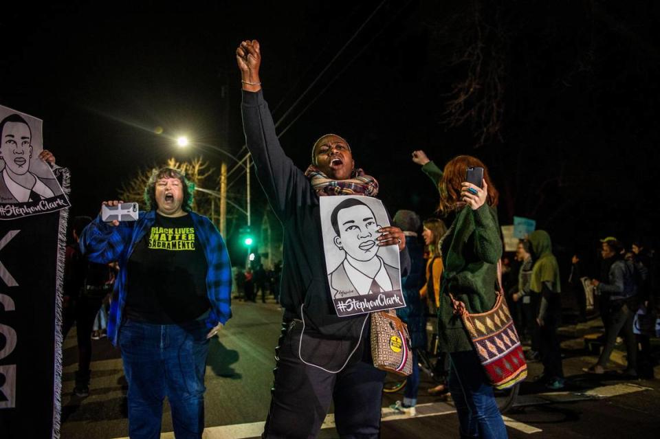 Protesters chant during a march protesting the Sacramento County DA’s decision in the Stephon Clark case Monday, March 4, 2019, in East Sacramento. The march ended with more than 80 people arrested. Hector Amezcua/Sacramento Bee file