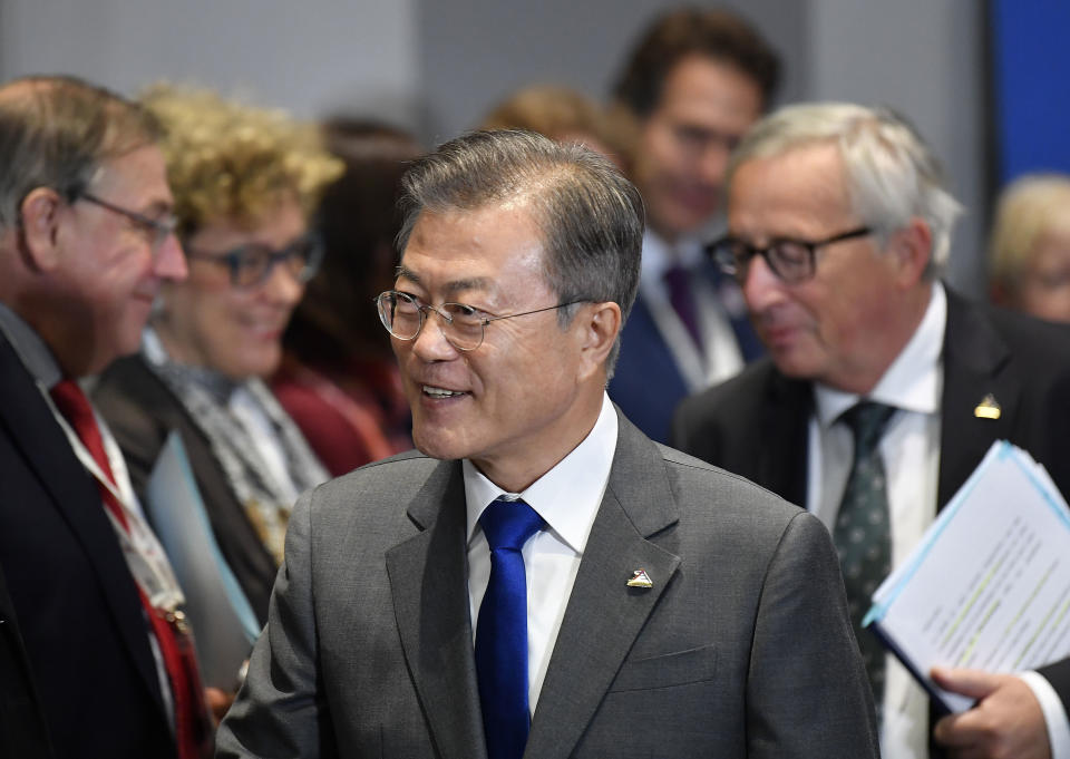 South Korea's President Moon Jae-in arrives for a meeting on the sidelines of the EU-ASEM leaders summit in Brussels, Friday, Oct. 19, 2018. (Toby Melville, Pool Photo via AP)