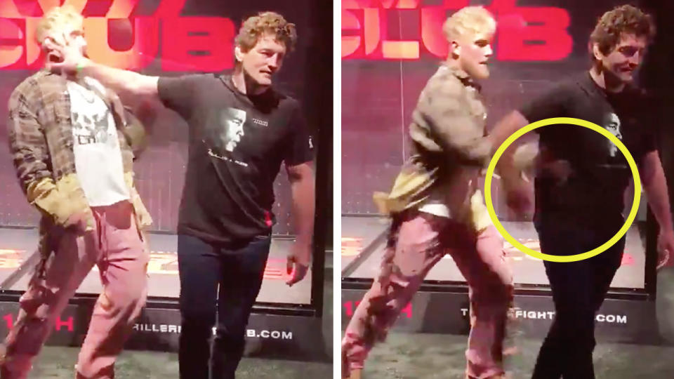 Former UFC fighter Ben Askren (pictured right) pushing YouTuber Jake Paul (pictured left) in the face before Paul slaps him (pictured right).