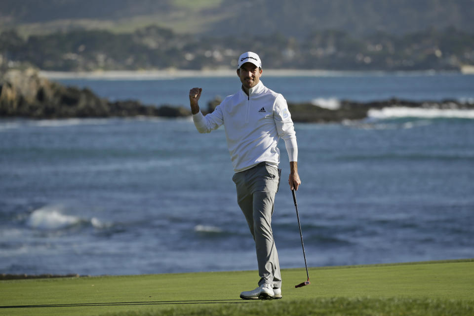 Nick Taylor, of Canada, reacts on the 18th green of the Pebble Beach Golf Links after winning the AT&T Pebble Beach National Pro-Am golf tournament Sunday, Feb. 9, 2020, in Pebble Beach, Calif. (AP Photo/Eric Risberg)