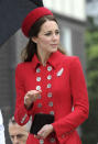 Britain's Kate, the Duchess of Cambridge, attends the official welcome ceremony at Government House, in Wellington, New Zealand, Monday, April 7, 2014. Britain's Prince William and his wife, Kate, arrived in New Zealand's capital to cheers from locals who braved windy, rainy weather to catch a glimpse of the royal couple. (AP Photo/SNPA, Ross Setford) NEW ZEALAND OUT