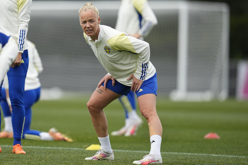 Sweden's Caroline Seger stretches during a training session ahead of the FIFA Women's World Cup semifinal soccer match between Sweden and Spain in Auckland, New Zealand, Monday, Aug. 14, 2023. (AP Photo/Abbie Parr)
