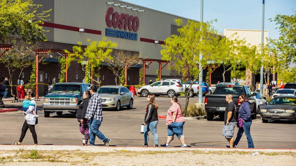 TUCSON, UNITED STATES - March 29: Shoppers practicing social distancing lined up outside Costco store in Tucson during the coronavirus pandemic.