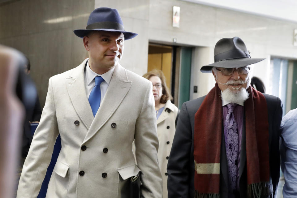Defense attorney Arthur Aidala, left, and his father Louis Aidala, arrive at court for the sentencing of Harvey Weinstein, in New York, Wednesday, March 11, 2020. Weinstein faces a minimum of 5 years and a maximum of 29 years in prison for raping an aspiring actress in 2013 and forcibly performing oral sex on a TV and film production assistant in 2006. A second criminal case is pending in California. (AP Photo/Richard Drew)