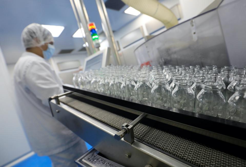 A lab technician works on investigational coronavirus disease (COVID-19) treatment drug "Remdesivir" at Eva Pharma Facility in Cairo, Egypt June 25, 2020.