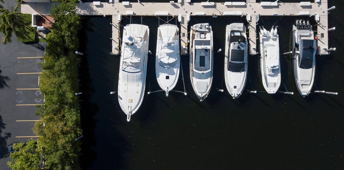 A view of developer Rishi Kapoor’s slip, far left, at the Cocoplum Yacht Club on Monday, Aug. 14, 2023, in Coral Gables, Florida.