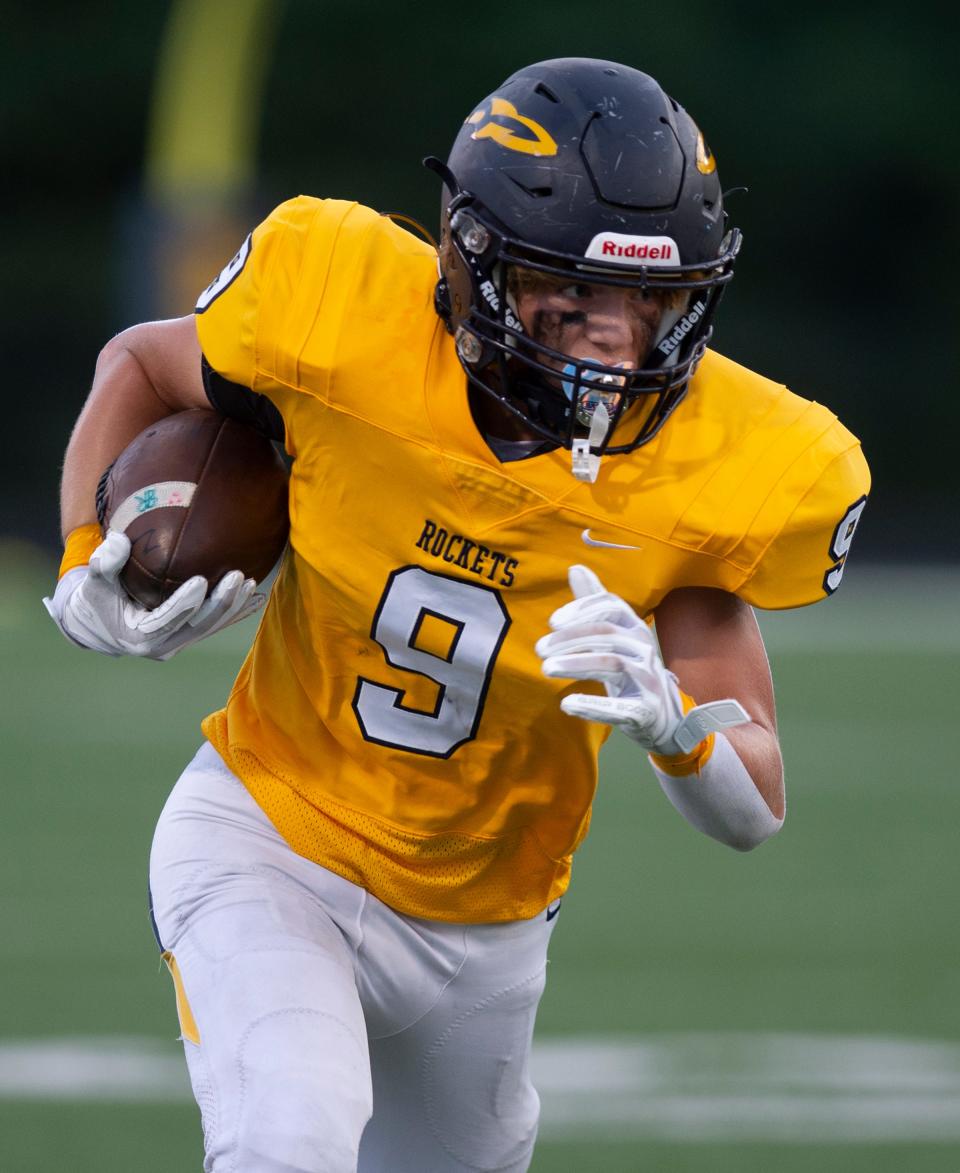 Streetsboro's Jackson Gula carries the ball against Ravenna during the 2022 season.