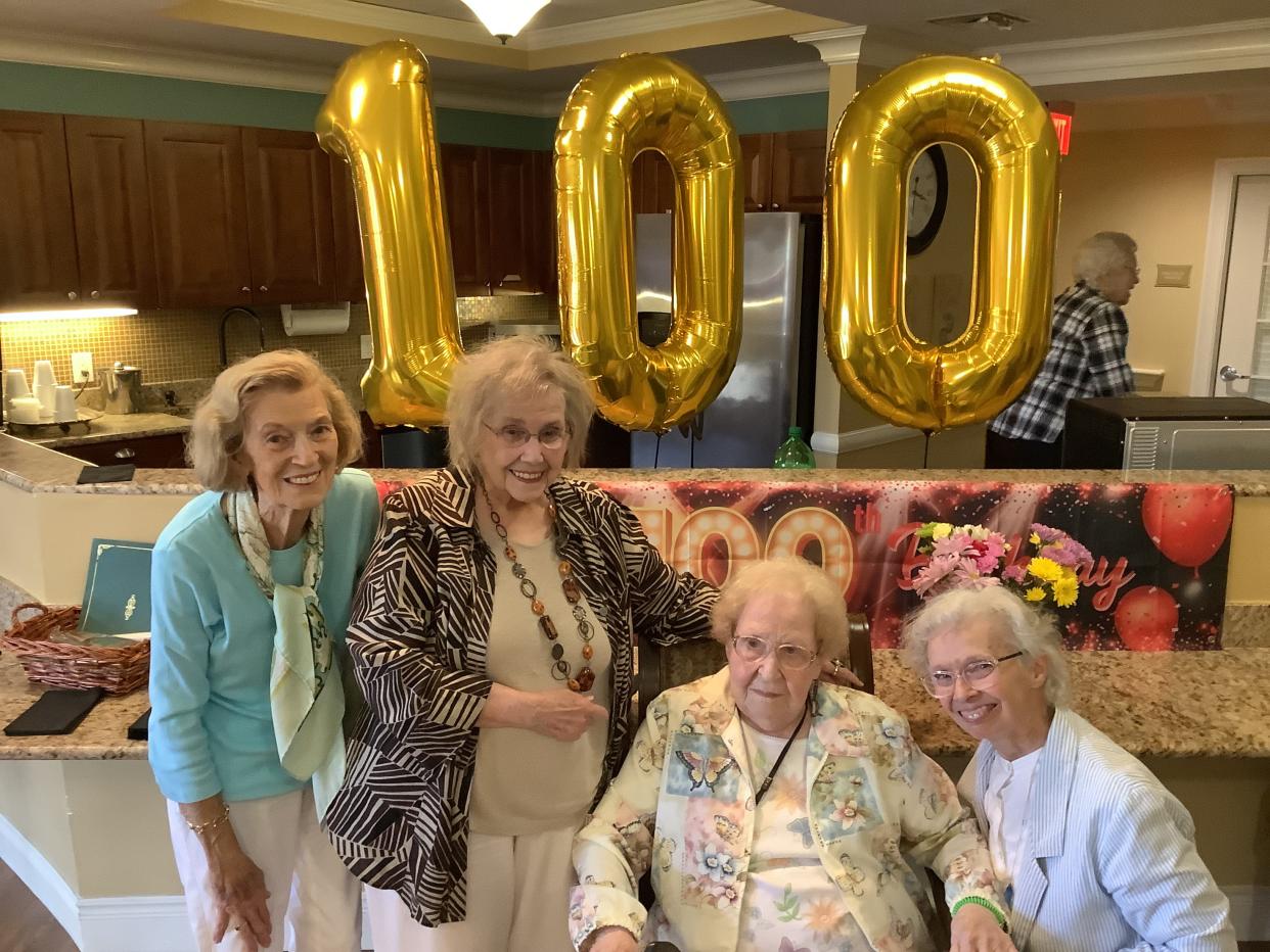 Celebrating: Julia Hoppe, from left, Helen Corbett, Tiddle Thomas and Lydia Corrill. It was Tiddle's 100th birthday celebration.