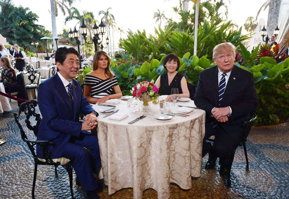President Trump and first lady Melania Trump are seated for dinner with Japanese Prime Minister Shinzo Abe and his wife, Akie Abe, at Trump's Mar-a-Lago resort in Palm Beach, Fla., April 17, 2018. (Photo by Mandel NganGAN/AFP via Getty Images)