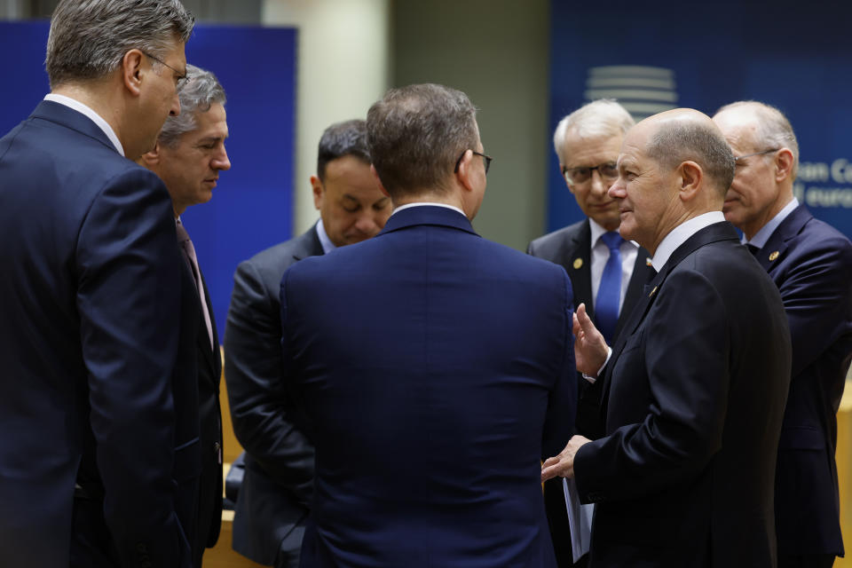 From left, Croatia's Prime Minister Andrej Plenkovic, Slovenia's Prime Minister Robert Golob, Ireland's Prime Minister Leo Varadkar, Finland's Prime Minister Petteri Orpo, Bulgaria's Prime Minister Nikolai Denkov, Germany's Chancellor Olaf Scholz and Luxembourg's Prime Minister Luc Frieden talk during a round table meeting at an EU summit in Brussels, Thursday, Feb. 1, 2024. European Union leaders meet in Brussels for a one day summit to discuss the revision of the Multiannual Financial Framework 2021-2027, including support for Ukraine. (AP Photo/Geert Vanden Wijngaert)