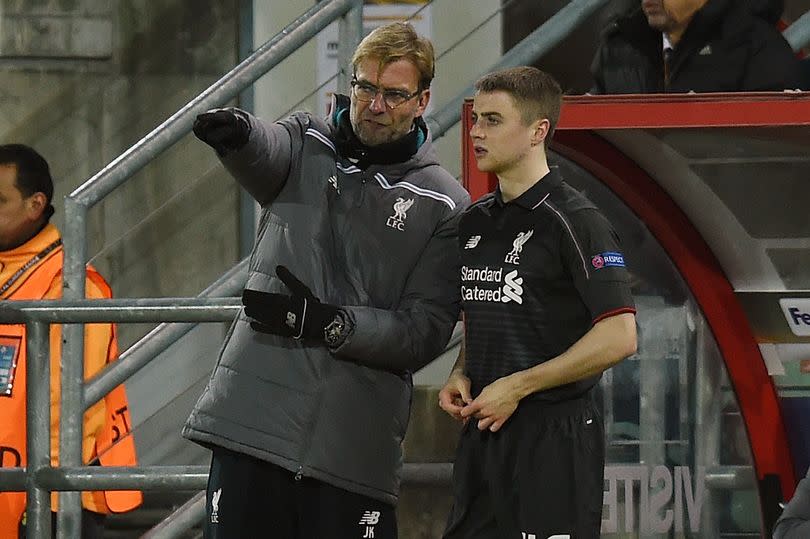 Jordan Rossiter being instructed by Jurgen Klopp before coming on for Liverpool back in 2015 -Credit:John Powell/Liverpool FC via Getty Images