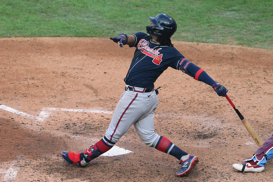 PHILADELPHIA, PA - AUGUST 09: Ronald Acuna Jr. #13 of the Atlanta Braves hits a two run home run during the sixth inning against the Philadelphia Phillies in game two of a double header at Citizens Bank Park on August 9, 2020 in Philadelphia, Pennsylvania. The Braves defeated the Phillies 8-0.  (Photo by Rich Schultz/Getty Images)