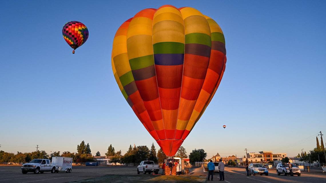 Hot air balloons take to the skies at the Clovis Rodeo Grounds during a media event on Friday, Sept. 23, 2022 promoting this weekend’s 47th annual ClovisFest and hot air balloon fun fly.