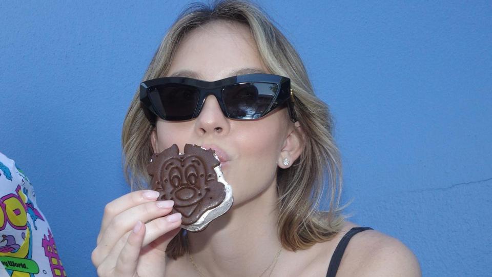 Sydney Sweeney poses with an ice cream sandwich 