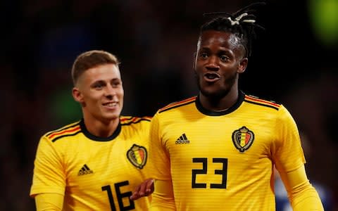 Belgium's Michy Batshuayi celebrates scoring their third goal with Thorgan Hazard against Scotland.  - Credit: REUTERS