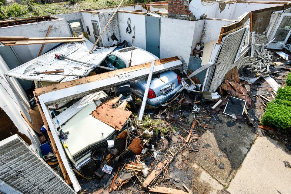 Volunteer groups and residents worked together Saturday, June 1 to clear debris from some of the neighborhoods in Trotwood and other areas hit by the tornado. (WHIO File)