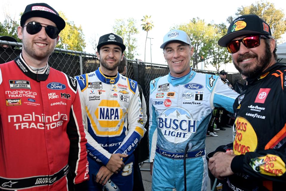 LOS ANGELES, CALIFORNIA - FEBRUARY 05: (L-R) Chase Briscoe, driver of the #14 Mahindra Tractors Ford, Chase Elliott, driver of the #9 NAPA Auto Parts Chevrolet, Kevin Harvick, driver of the #4 Busch Light Ford, and Martin Truex Jr., driver of the #19 Bass Pro Shops Toyota, wait backstage during pre-race ceremonies prior to the NASCAR Clash at the Coliseum at Los Angeles Memorial Coliseum on February 05, 2023 in Los Angeles, California. (Photo by Araya Doheny/Getty Images)