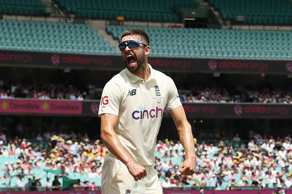 Mark Wood (pictured) reacts towards the crowd after stopping a boundary in the field during day four of the Fourth Test Match in the Ashes series.