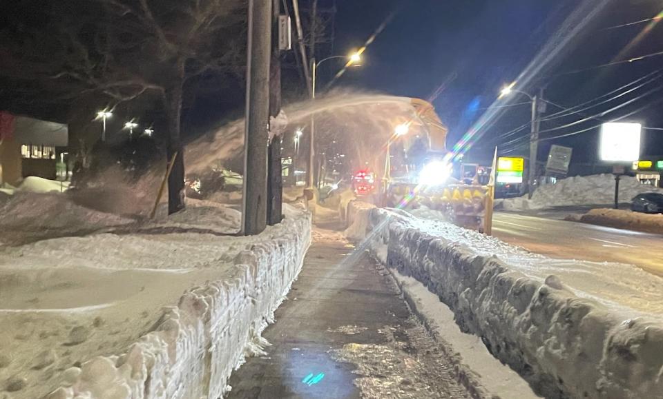 A snowblower clears a second northbound lane on University Avenue in Charlottetown, early Thursday morning. (Kevin Yarr/CBC - image credit)