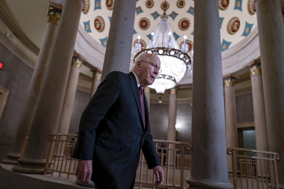 Senate Appropriations Committee Chair Patrick Leahy, D-Vt., returns to his office as negotiations continue on the government spending package, at the Capitol in Washington, Monday, Dec. 19, 2022. (AP Photo/J. Scott Applewhite)