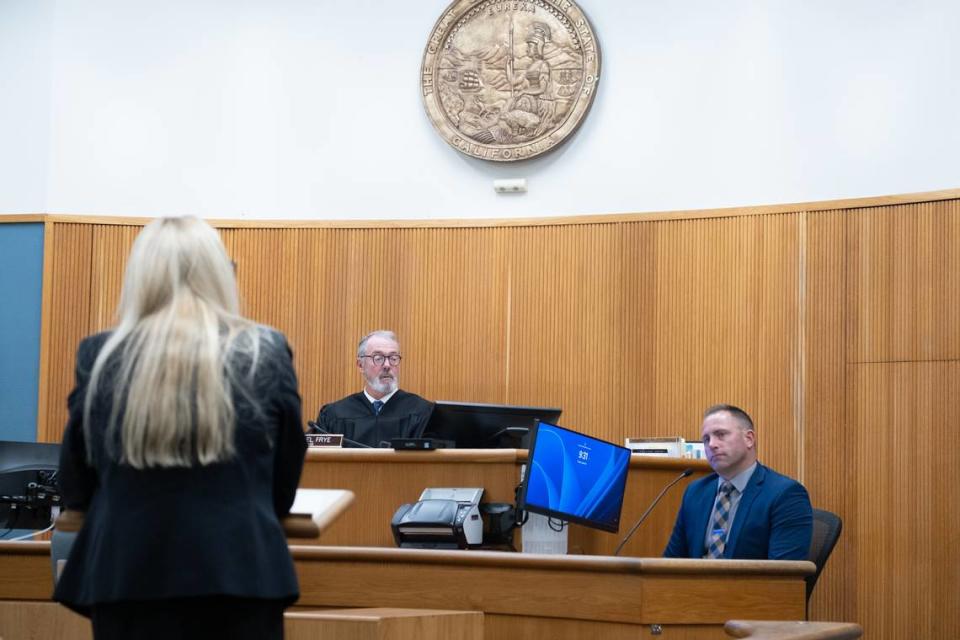 San Luis Obispo Deputy District Attorney Kimbery Dittrich, left, questions SLOPD Det. Bent Inglehart during the preliminary hearing for Nate Abate in San Luis Obispo Superior Court on Aug. 29, 2023. San Luis Obispo Superior Court Judge Michael Frye, center, presides.