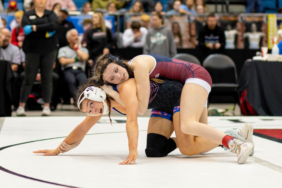 Seaman's Taylie Heston wrestles Washburn Rural's Lacey Middleton at 6-5A Girls State Wrestling at Hartman Arena on Saturday, Feb. 24, 2024.