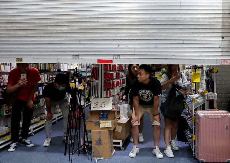 Anti-government demonstrators attend a protest march in Hong Kong