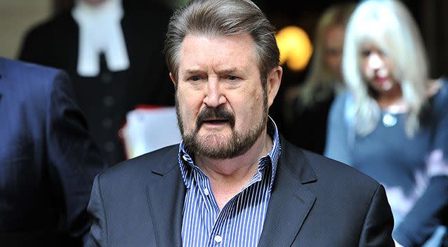 Broadcaster Derryn Hinch leaves the Supreme Court of Victoria in Melbourne, Friday, Oct. 18, 2013. Photo: AAP Library