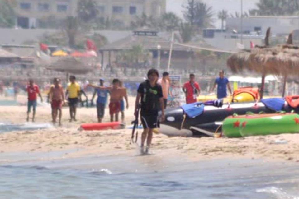 The gunman walks down the beach in Sousse, Tunisia (Sky News)
