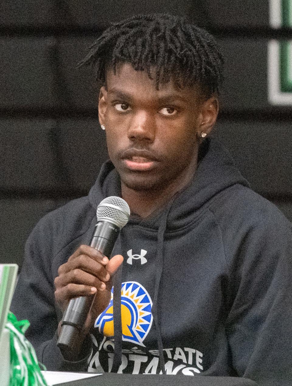 St. Mary's High School athlete Legend Moore has signed letter of intent to run track for San Jose State during a ceremony at the school in Stockton on Apr. 17, 2024.