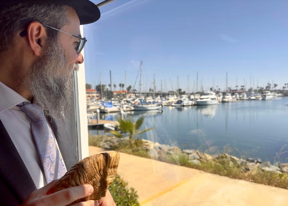 Rabbi Dov Muchnik looks with a smile at the waterfront view from Chabad of Oxnard's new location at Channel Islands Harbor on Wednesday.