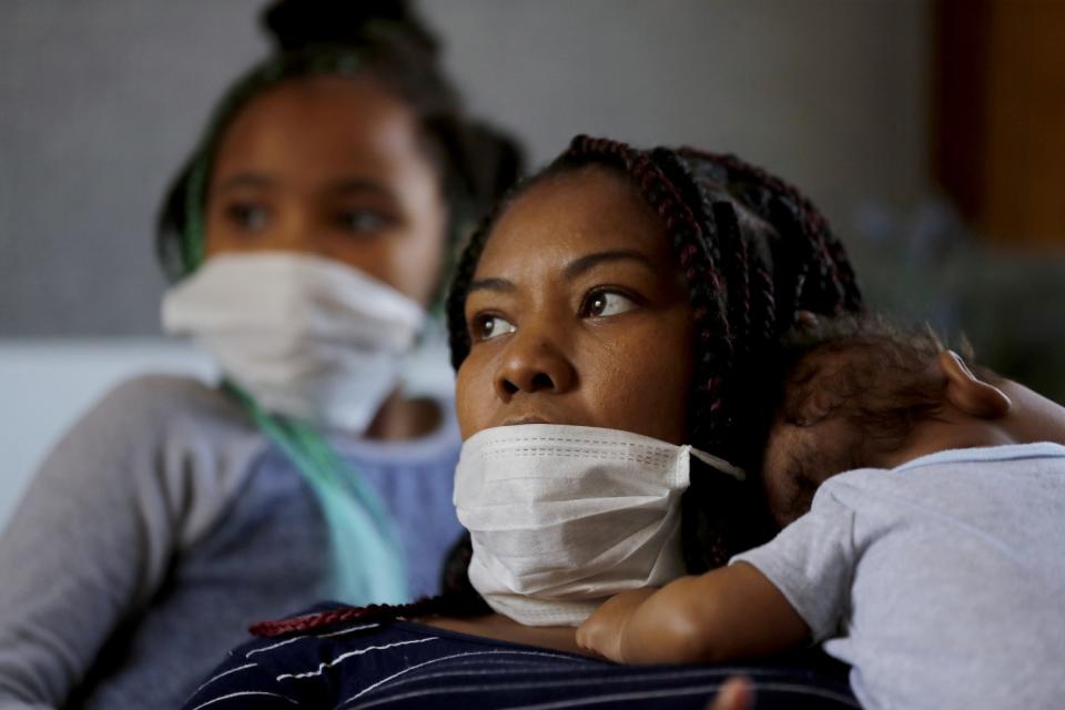 Nicole Bradley-Bibb lives with her two children, Annalise and Dallas, in a South Los Angeles trailer shelter.